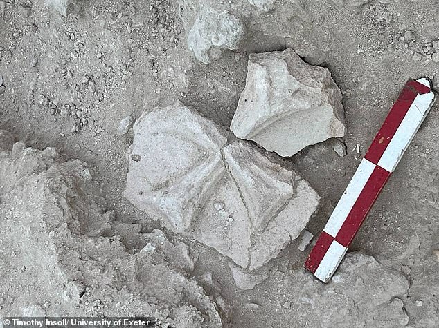 Researchers discovered three plaster crosses (one in the photo) hanging inside the building