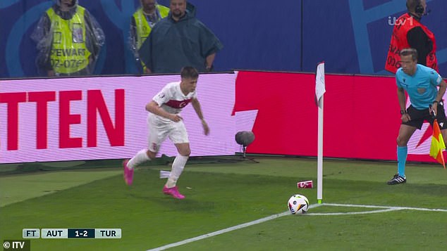 Arda Guler had cups thrown at him when he tried to take a corner for Turkey against Austria