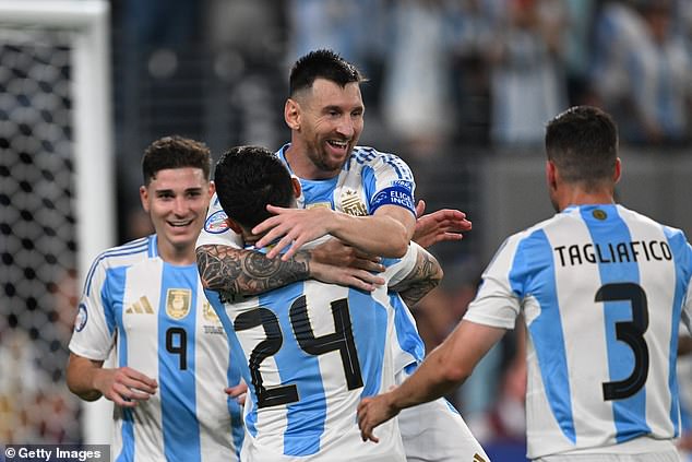 Lionel Messi celebrates with his teammates after Argentina doubled their lead in the semi-finals