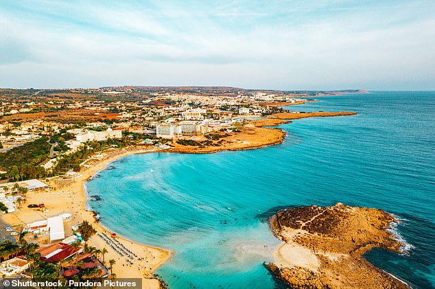 At least 26 guests at a hotel in Cyprus have been hospitalized after inhaling toxic fumes from a hotel swimming pool. Pictured: A stock photo of Nissi Beach in Ayia Napa, Cyprus