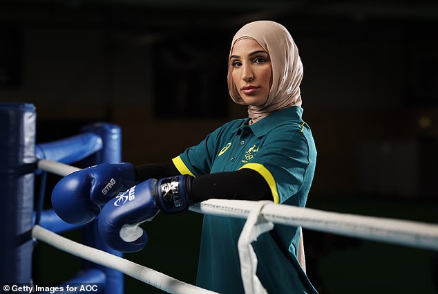 Australian boxer Tina Rahimi (pictured) has criticised France for maintaining a controversial ban on headscarves at the Paris Games