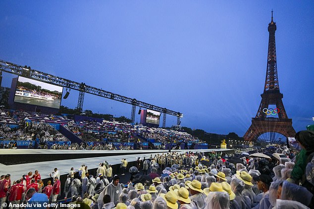 Australian viewers were left confused as they tuned in on Saturday to watch the highly anticipated Paris 2024 Olympic Games (participants gather around the River Seine)