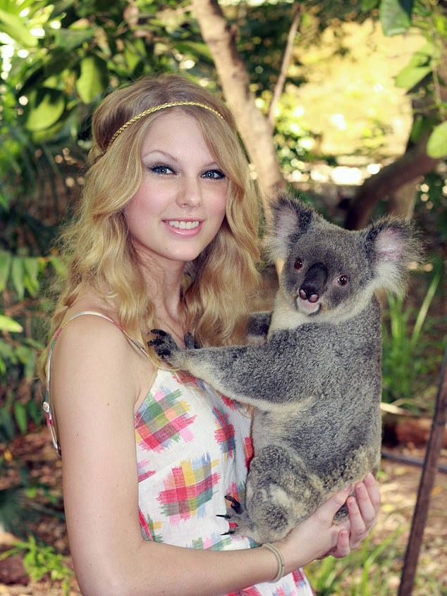 Taylor Swift hugs a koala at the Lone Pine Koala Sanctuary in Australia in 2009