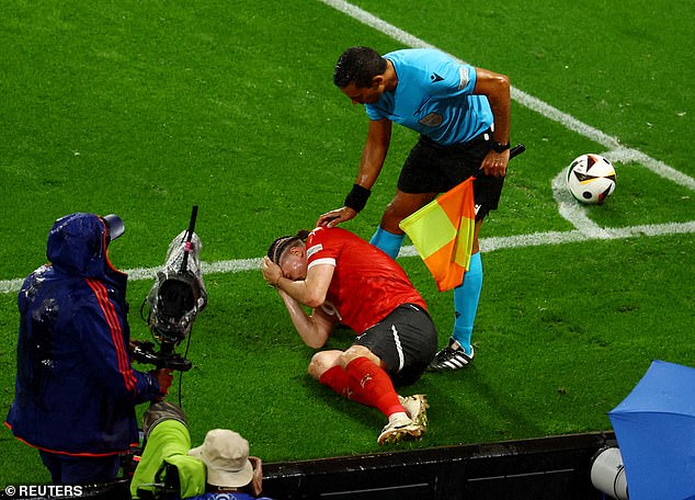 Marcel Sabitzer appeared to be hit by an object during Austria's round of 16 match against Turkey