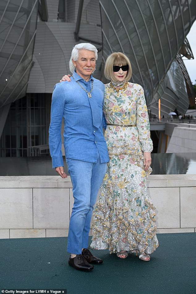 Australian director Baz Luhrmann was criticized by fans after he walked around Paris in a double denim suit over the weekend