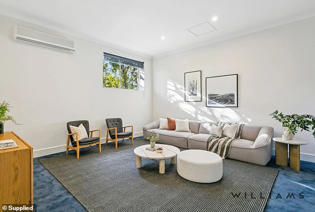 The relaxing and spacious living room on the upper floor