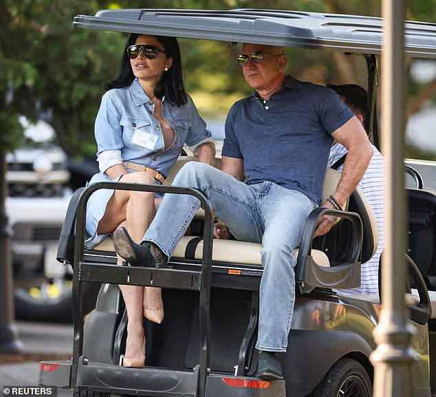 Gates and Hurd were joined by power couple Jeff Bezos and Lauren Sanchez, who rode in a golf cart in matching jeans