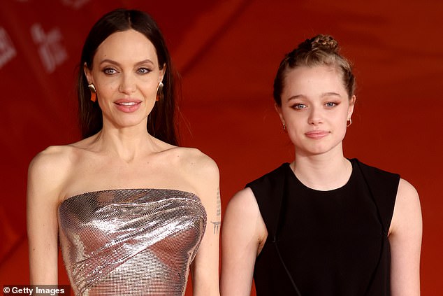 Brad Pitt's daughter Shiloh Jolie has officially and legally dropped her father's last name. - pictured with mother Angelina Jolie in 2021