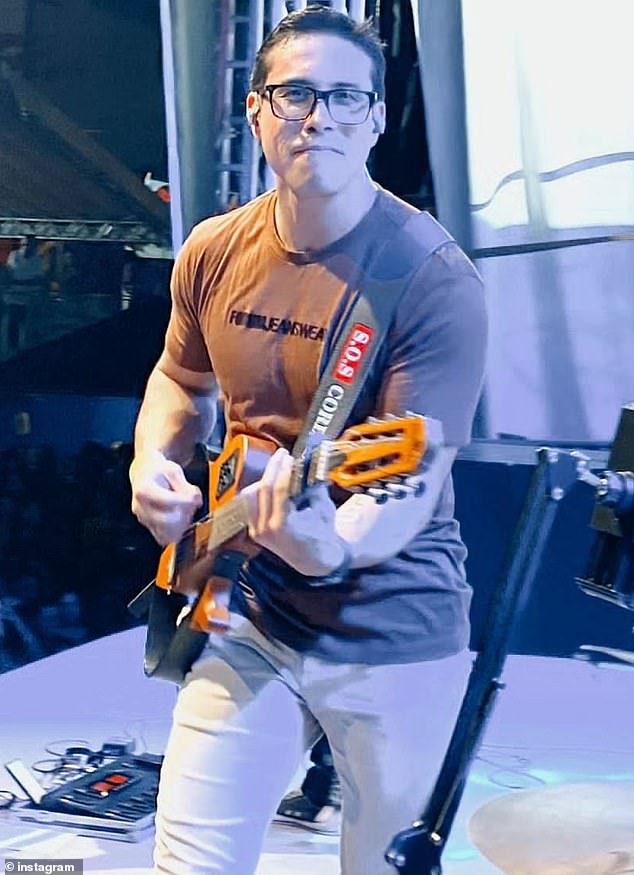 Brazilian rock singer Ayres Sasaki has died at the age of 35 after being electrocuted on stage in the seaside resort of Salinópolis, Pará, over the weekend; pictured during a performance last year