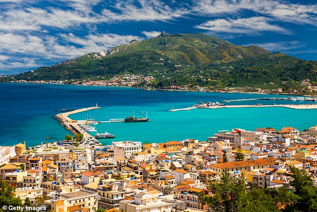 Pictured: Summer view of Zakynthos town in Zante, Greece. On Wednesday, a British man died after falling head first from a hotel balcony. Hours earlier, another British man was injured in the same area after falling from a first-floor balcony