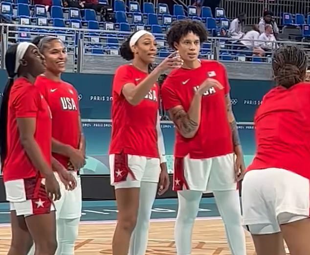 Brittney Griner and A'ja Wilson respond to fan holding pro-Caitlin Clark sign at Olympics