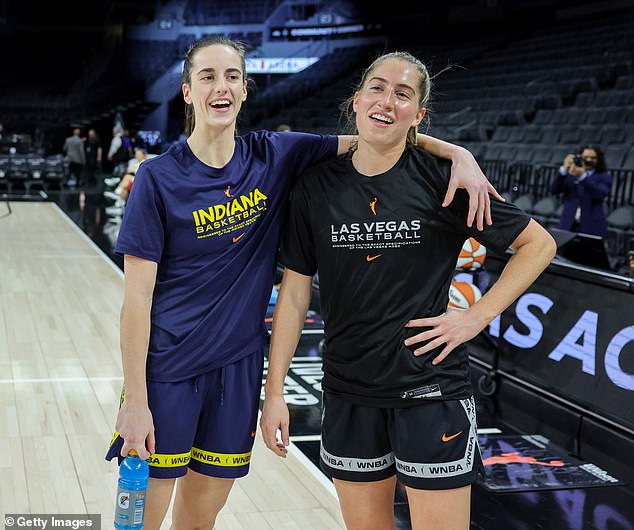 Caitlin Clark and Kate Martin greet each other on the court in May for Fever-Aces in Las Vegas