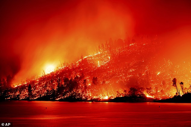 The Thompson Fire, seen here, broke out just before noon Tuesday about 70 miles (113 kilometers) north of the state capital, Sacramento