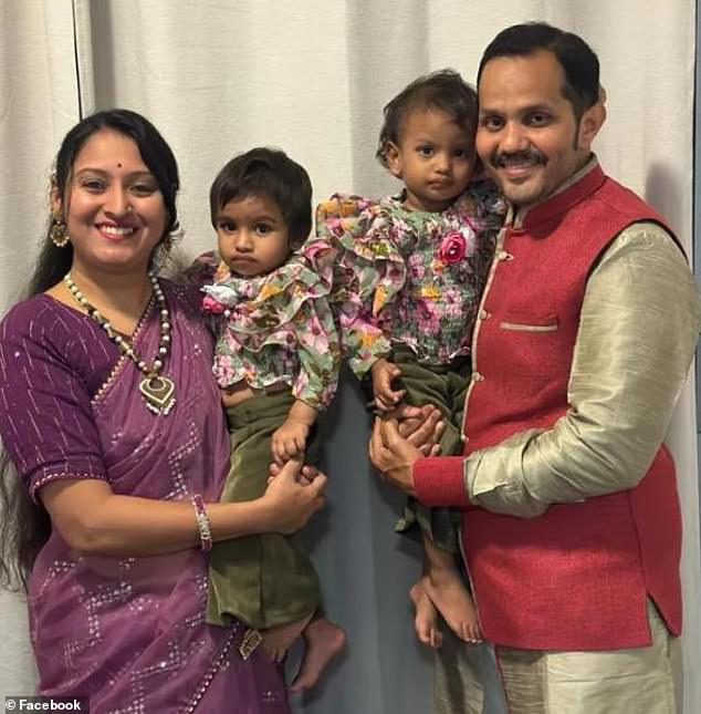 Anand Runwal (right) and his wife Poonam Runwal with their two-year-old twin daughters