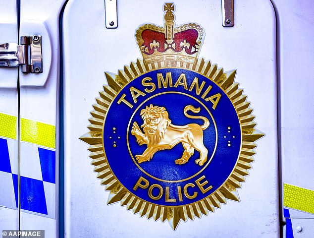 An investigation has found that former Tasmanian police officer Paul Reynolds manipulated or sexually abused 52 boys over 30 years and concealed it through his status.