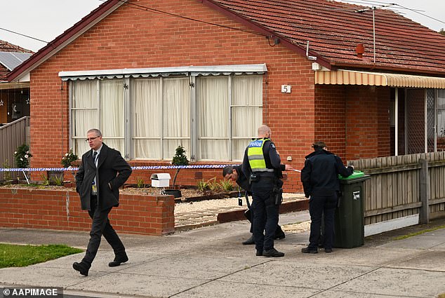 A house has been cordoned off on Hilgay Street in Coolaroo, Melbourne, after a woman's body was picked up from the suburb by a garbage truck