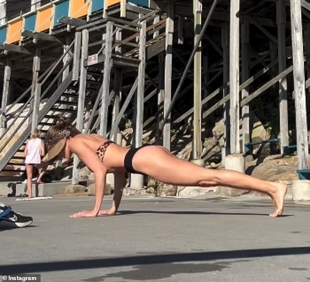 The 36-year-old Miss Universe Australia winner filmed herself doing deep squats and push-ups