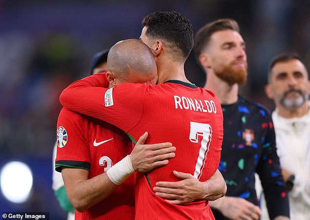 Cristiano Ronaldo (right) consoled an emotional Pepe after Portugal's defeat at Euro 2024