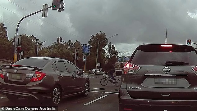 A cyclist who rode through a red light was hit at an intersection in Blacktown, western Sydney