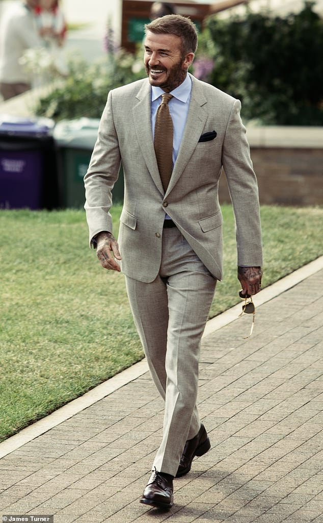 David Beckham, 49, was spotted for the first time in a luxury BOSS suit after signing a mega deal to become a global ambassador as he arrived on the first day of Wimbledon on Monday