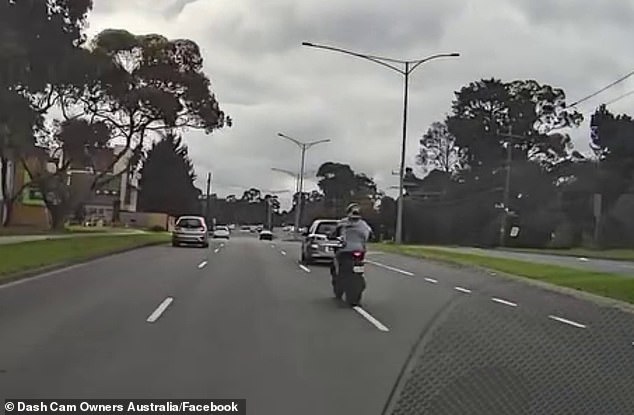 Shocking footage has captured the moment a motorcyclist miraculously survived a high-speed crash in Melbourne after another driver failed to give way.