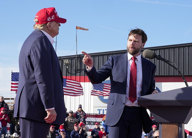 Sen. J.D. Vance, R-Ohio, right, points to Republican presidential candidate former President Donald Trump during a campaign rally, March 16, 2024, in Vandalia, Ohio