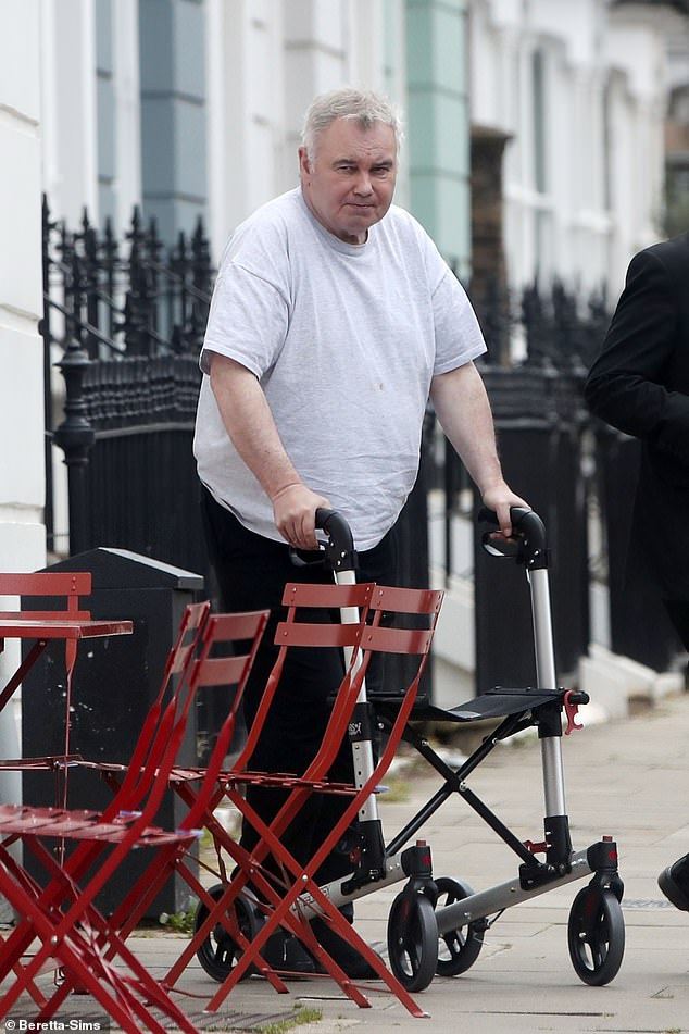 Eamonn Holmes looked dejected as he was photographed in public with a walking frame following his split from wife Ruth Langsford