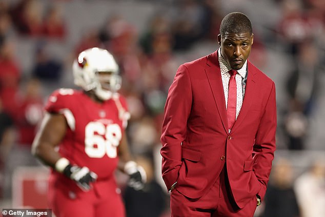 Former Arizona Cardinals safety and executive Adrian Wilson has been arrested in Scottsdale