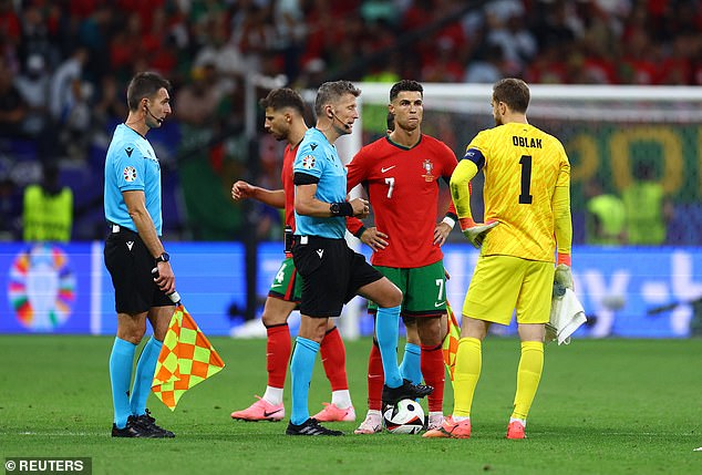 Football fans ridiculed the linesman during Portugal's Euro 2024 win over Slovenia on Monday after he was seen running onto the pitch