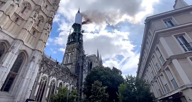 Thick black smoke was filmed coming from the main tower of Rouen Cathedral in the late morning, in an area where renovation work was taking place