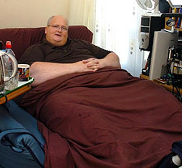 Former world's fattest man Paul Mason, from Ipswich, has spoken candidly about his fluctuating weight and said doctors predicted he would die before he was 40 (pictured in 2008, when he was at his heaviest, 80 stone).