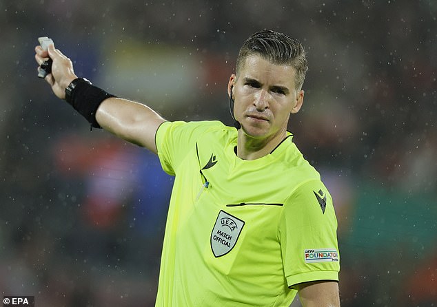 French referee Francois Letexier is handed Englands Euro 2024 final