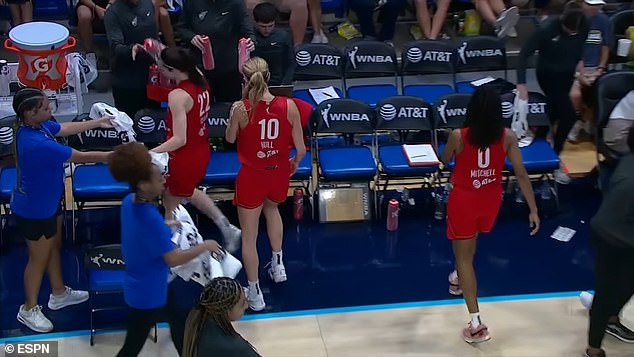 Clark returned to the bench after the turnover and promptly smashed her water bottle