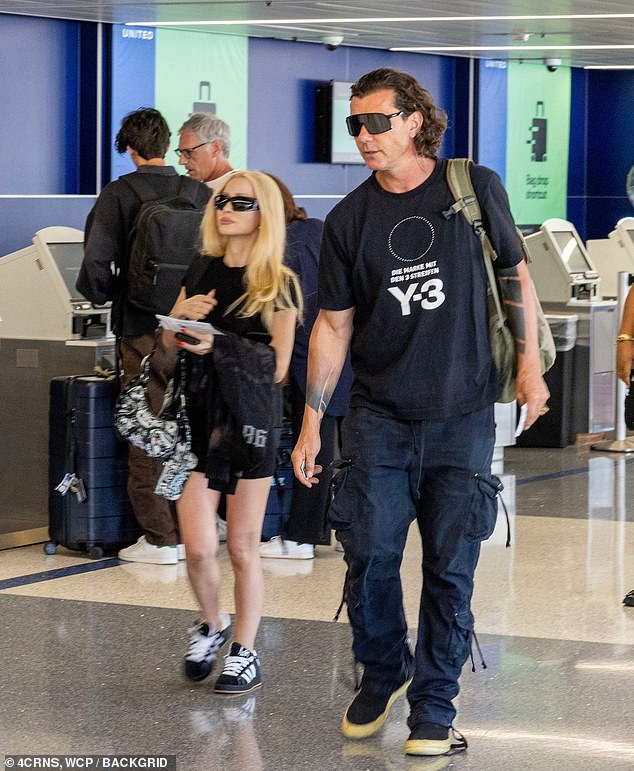 Gavin showed off his tattooed sleeves in a Y-3 T-shirt designed by Yohji Yamamoto with matching cargo pants and sneakers, while Xhoana wore a T-shirt, shorts and Adidas sneakers