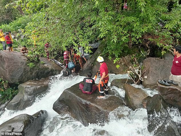 Rescue workers pulled the teenager's lifeless body from between two boulders the next morning