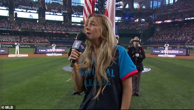 Four-time Grammy nominee Ingrid Andress struggled to sing the national anthem on Monday