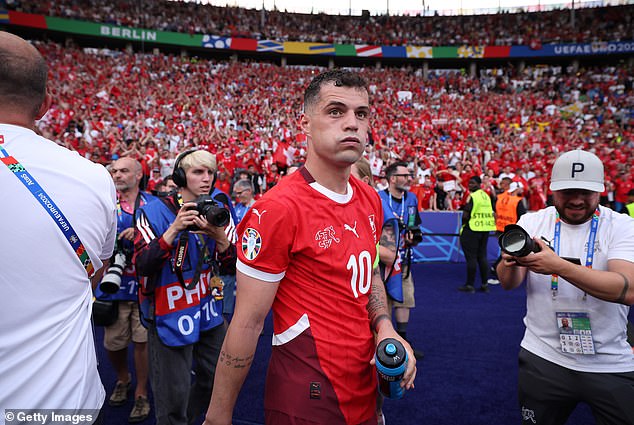 Granit Xhaka is to undergo an MRI scan for an adductor injury and could miss Switzerland's match against England, a report says