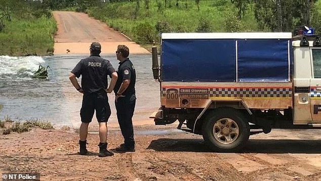 Police have launched an urgent search on land and in the water for the child. (Pictured: Police at the Moyle River crossing)
