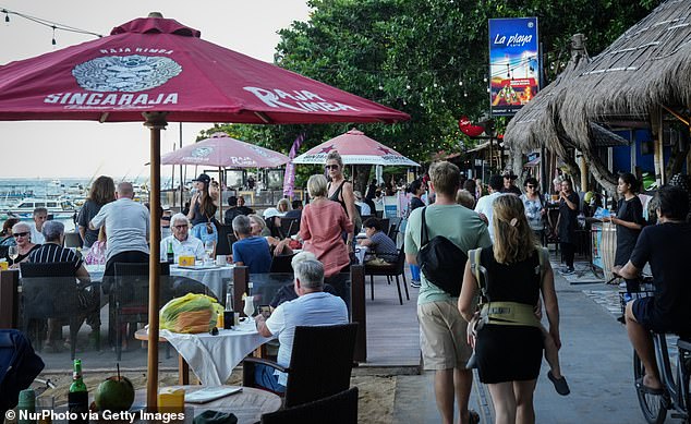 Australians are warned that European-style protests against tourism on the island are possible (pictured: tourists in Sanur, Bali)