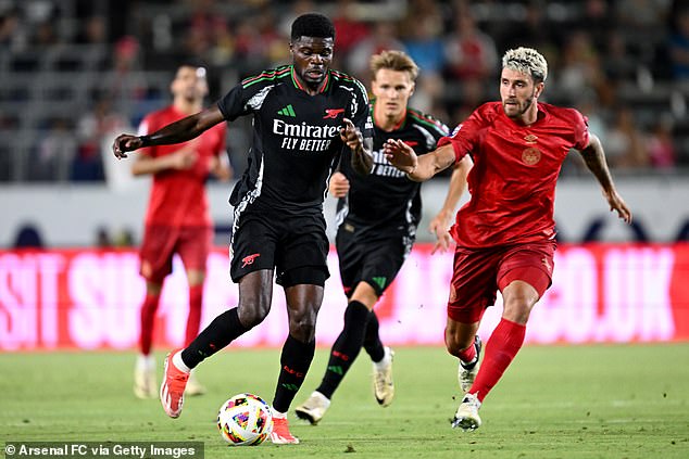 Arsenal's Thomas Partey #5 brings the ball onto the pitch during the second half