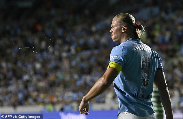 Erling Haaland celebrates scoring his third goal for his team on Tuesday night