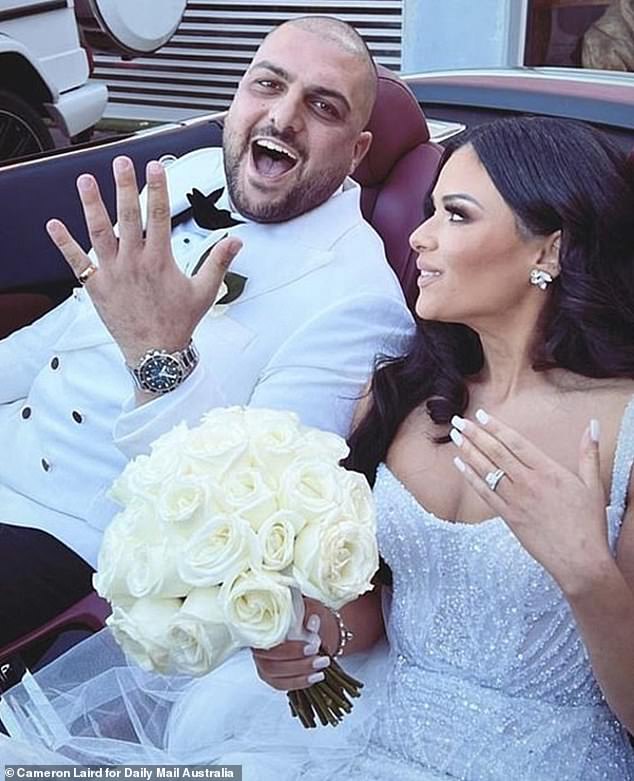 Robbie Awad is pictured with his wife Marina Hanna on their wedding day