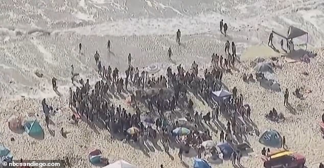 The dramatic incident occurred at Mission Beach in San Diego at around 4:50 p.m. on Tuesday, just an hour before high tide began.