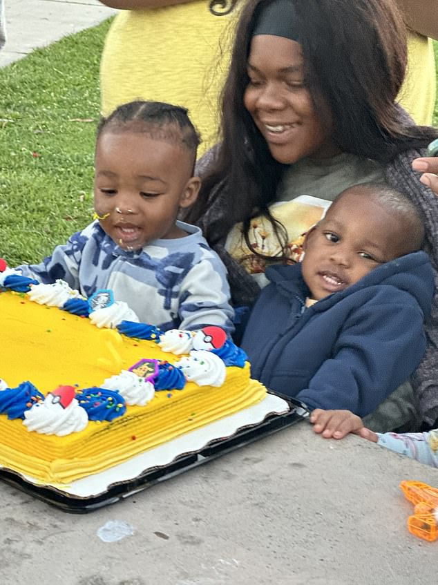 Jestice James, 22, with her twins Jestine, left, and Josiah, right. The young mother has been charged with two counts of murder and two counts of child abuse/endangerment under circumstances or conditions likely to result in serious bodily injury or death, prosecutors said.