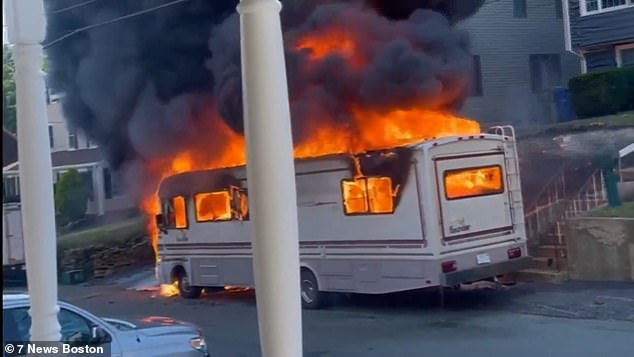 A grandfather, father and son were injured when their camper went up in flames in front of their Massachusetts home