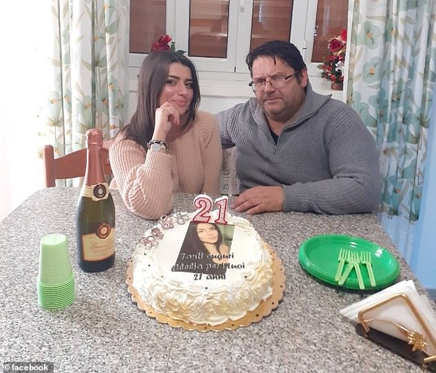 Clelia's father (pictured with his daughter on her 21st birthday) found her body this morning after calling her phone, which he heard ringing in the elevator