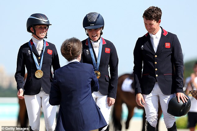 Rosalind Canter, Laura Collett and Tom McEwen (left to right) won gold for Great Britain on Monday