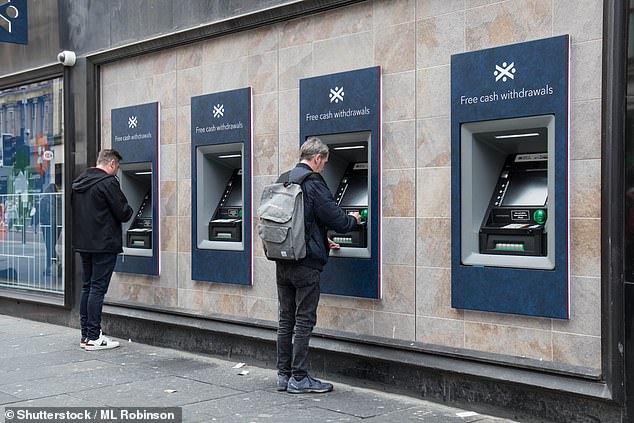 Some areas of London and the East of England will be without cash machines within two years if the current trend of closures continues (File photo)