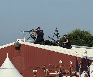 One group could be seen preparing their guns on a northern building