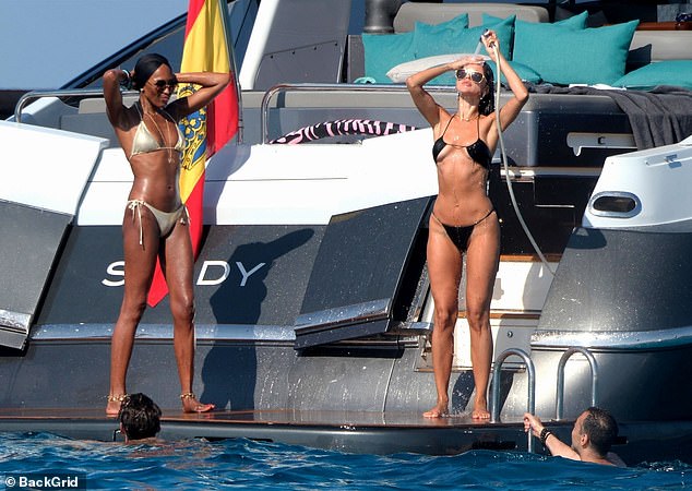 British supermodel Naomi Campbell and Mexican actress Eiza Gonzalez sunbathe on a luxury superyacht in Ibiza